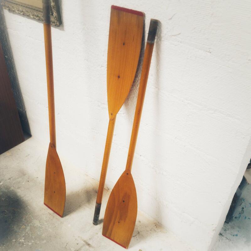 Pair of old wooden oars