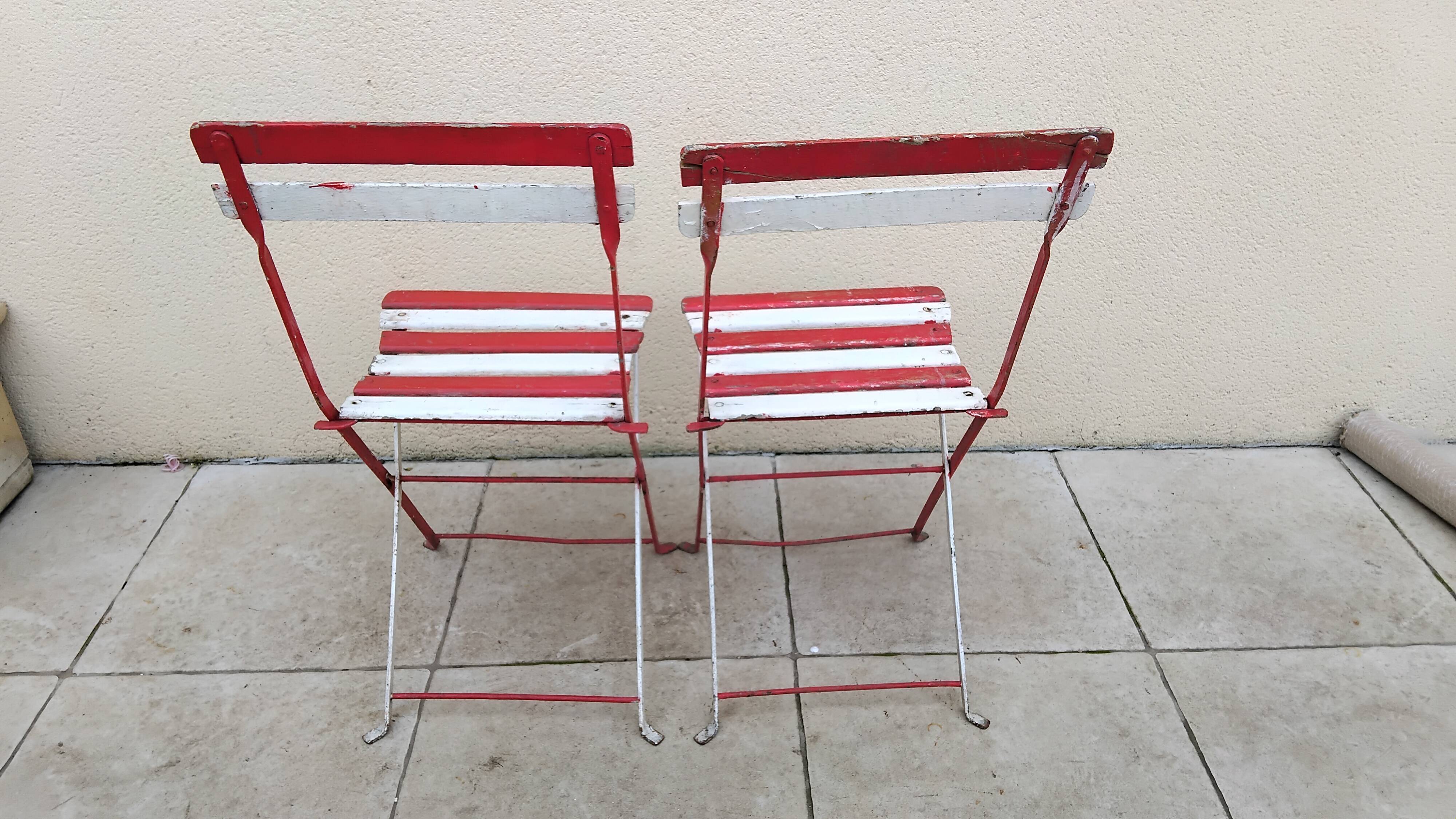 Pair of antique 1900s folding garden bistro chairs