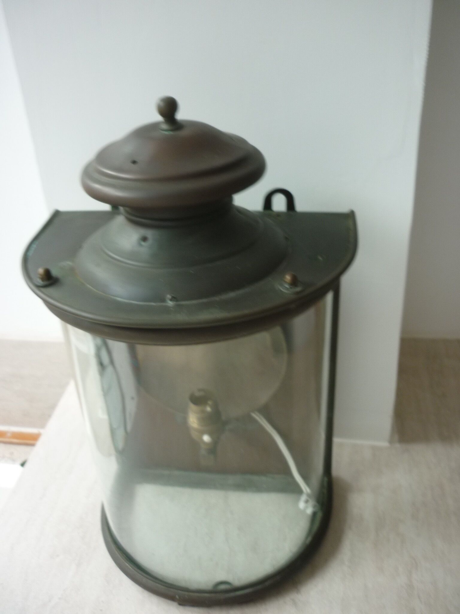 Ancient half-moon brass wall lantern