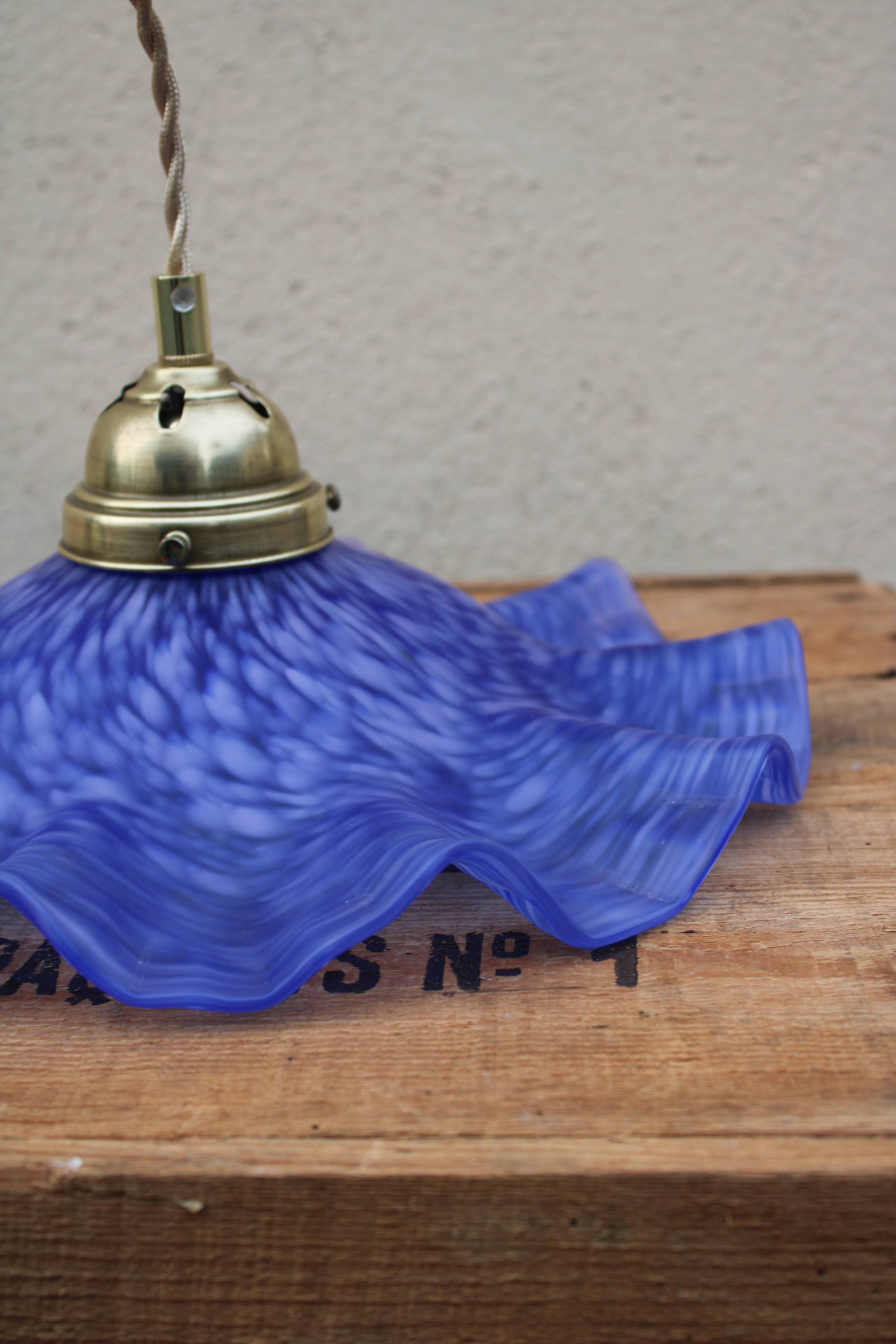 Hanging in blue glass paste