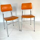 Pair of vintage orange leatherette chairs