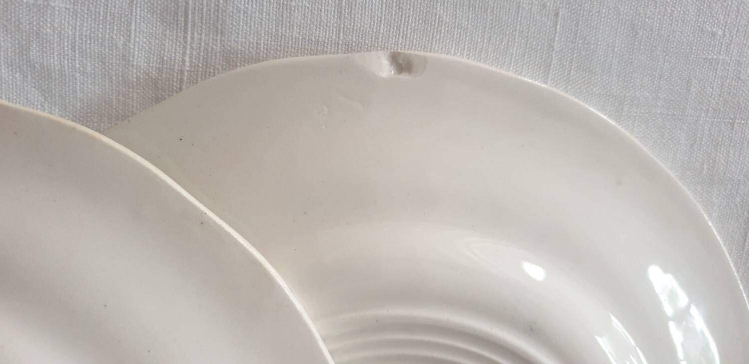 Four Marguerite plates