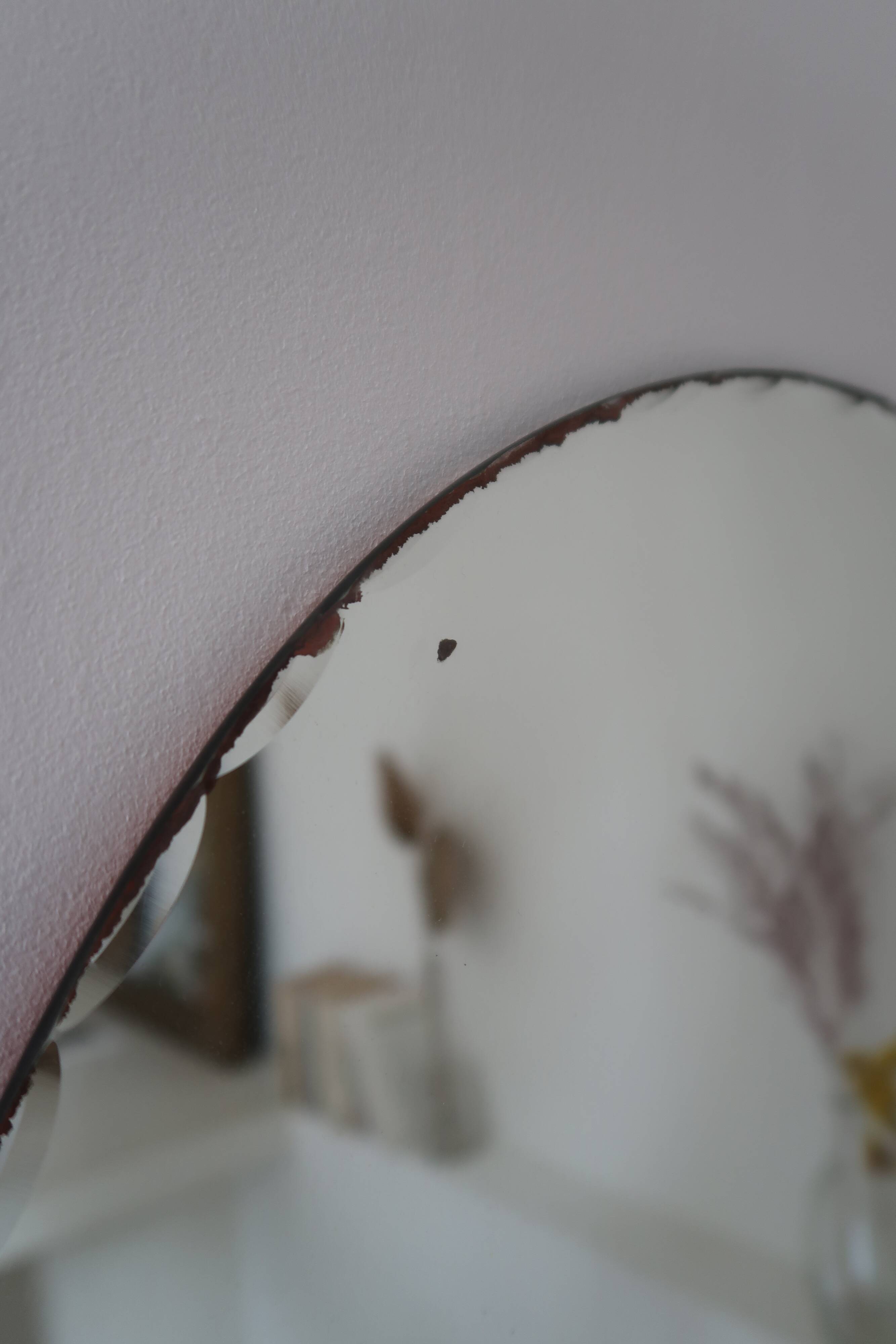 Vintage bevelled oval mirror