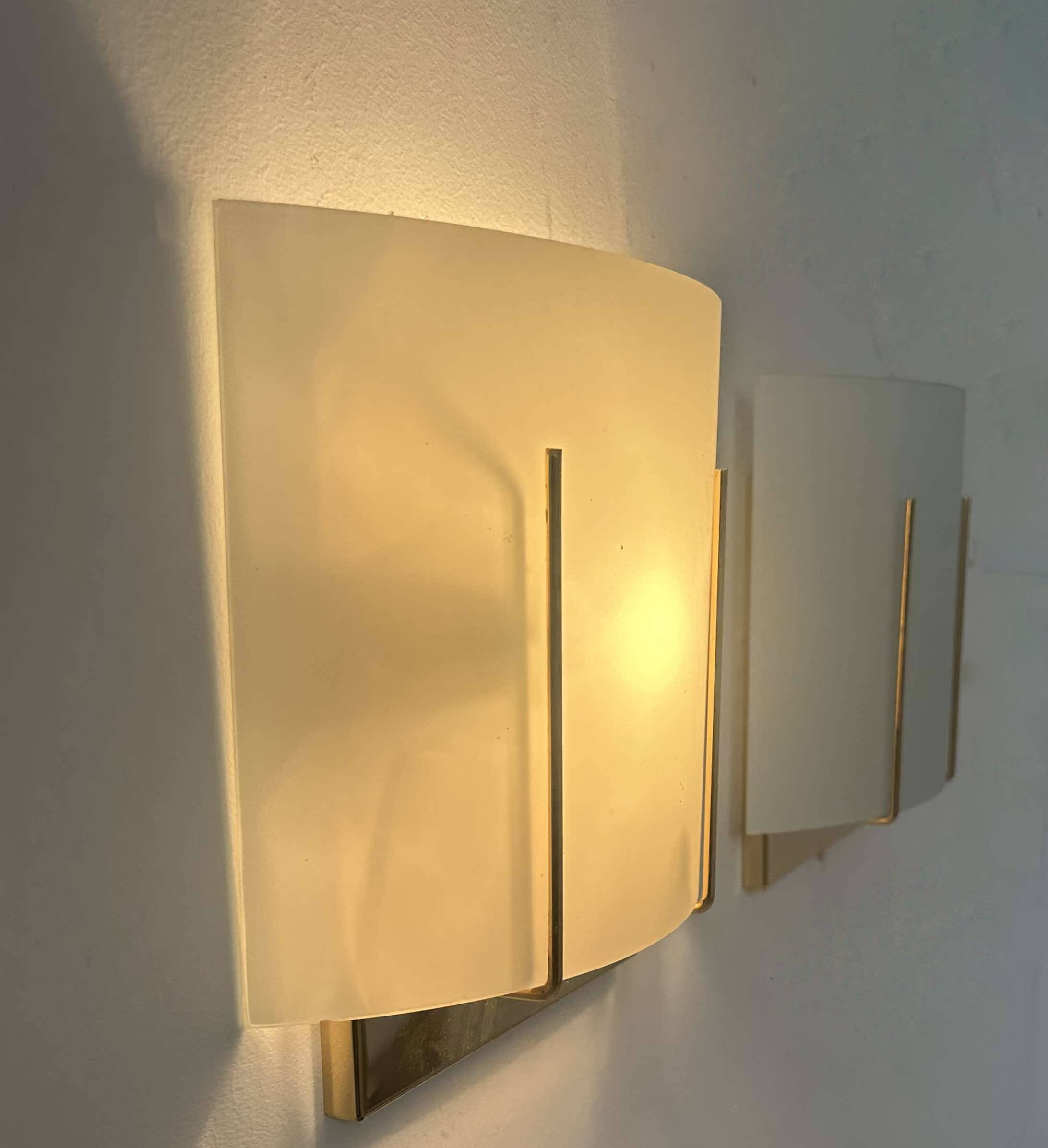 Pair of vintage wall lights, gilded brass and sandblasted glass, Italy 1970