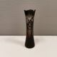 Crystal glass vase, in burgundy/reddish coloured glass with translucent details.