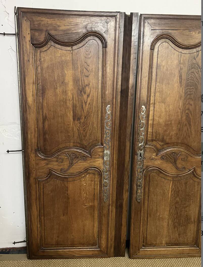 Pair of antique wardrobe doors and crosspiece