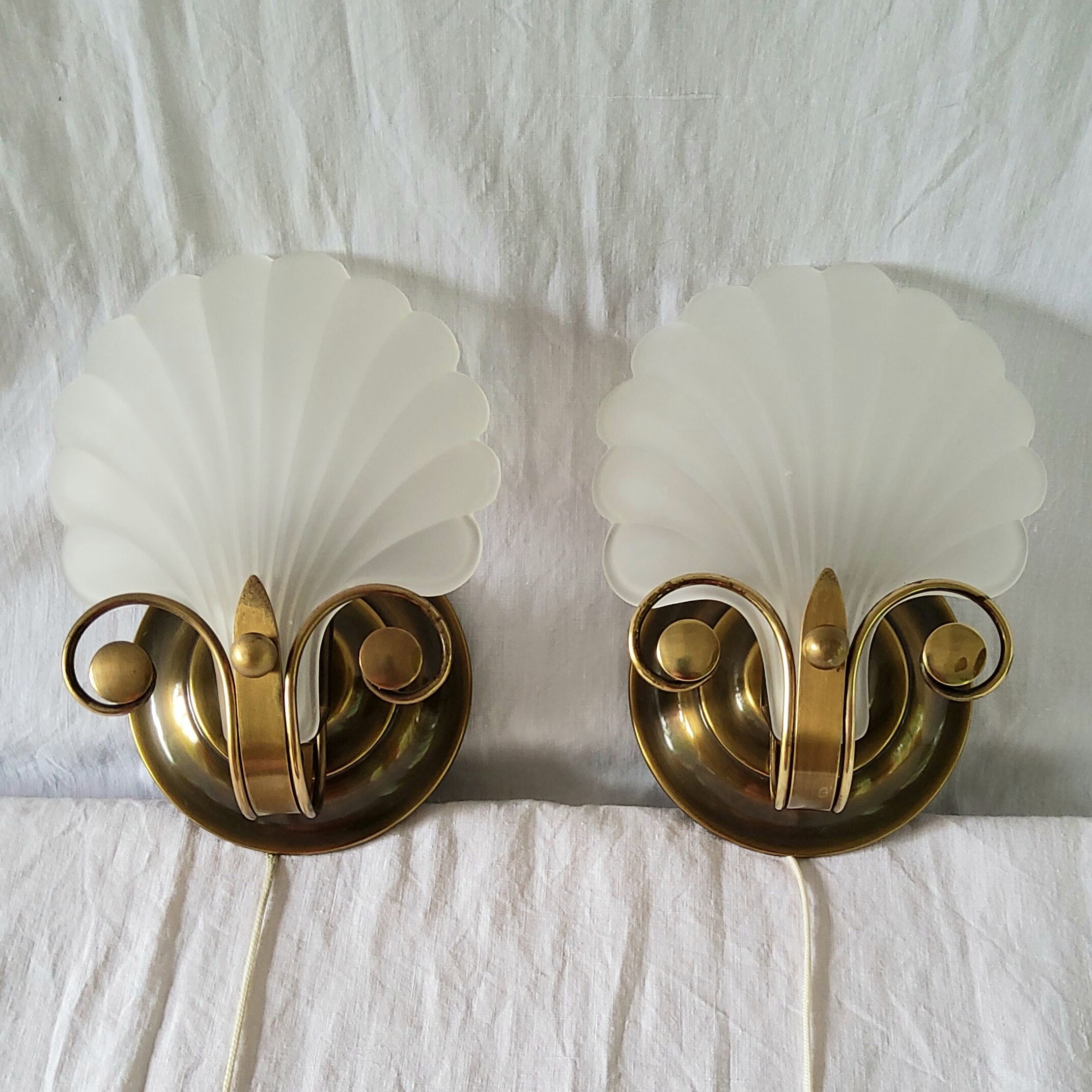 Pair of Deknudt shell sconces