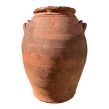 Ancient terracotta pottery jar
