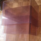 Trio of 70s smoked plexiglass nesting tables