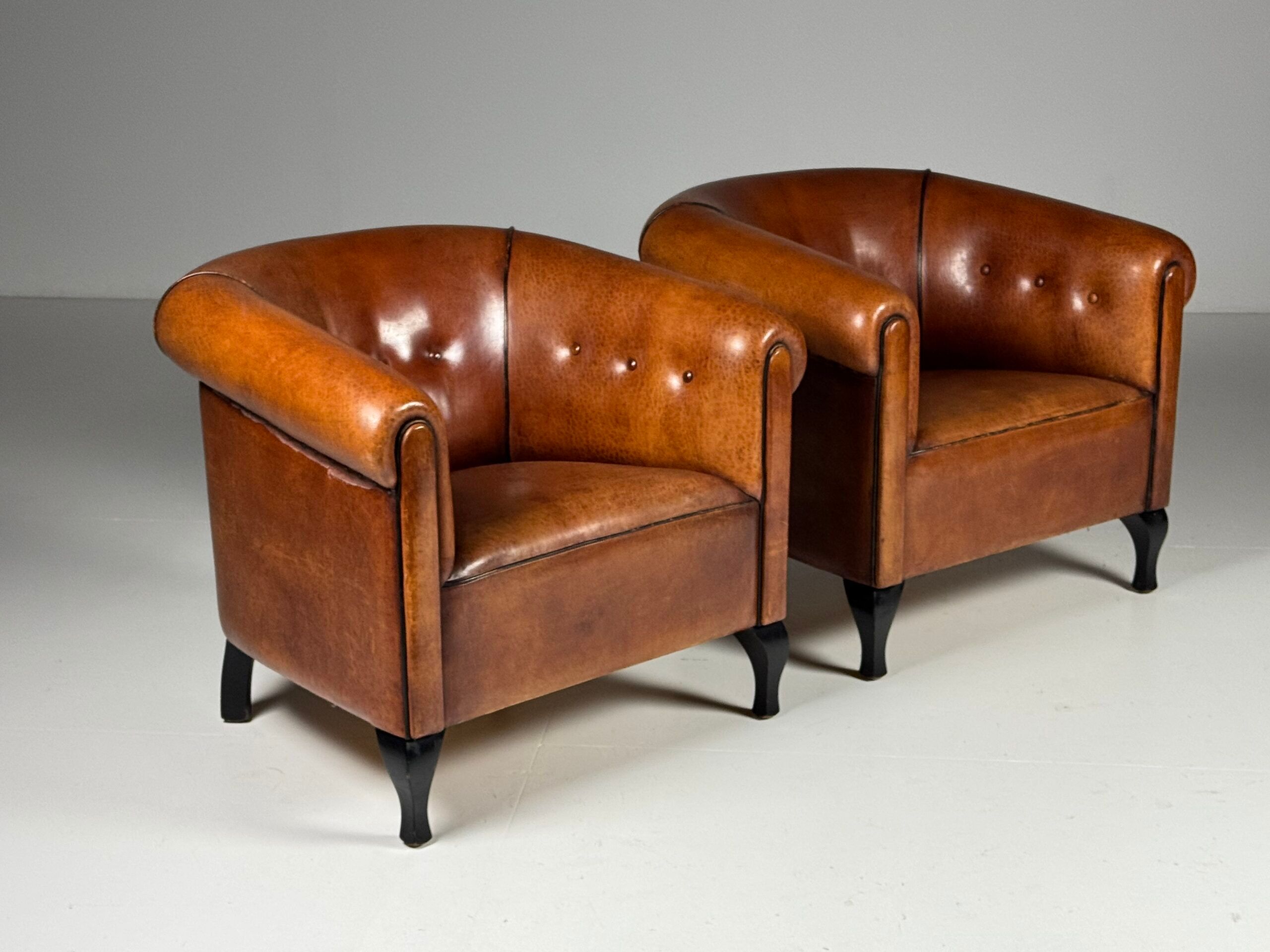 Ensemble de 2 fauteuils club en peau de mouton