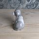 Small spaniel dog in porcelain