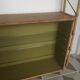 Wooden and rattan wall shelf