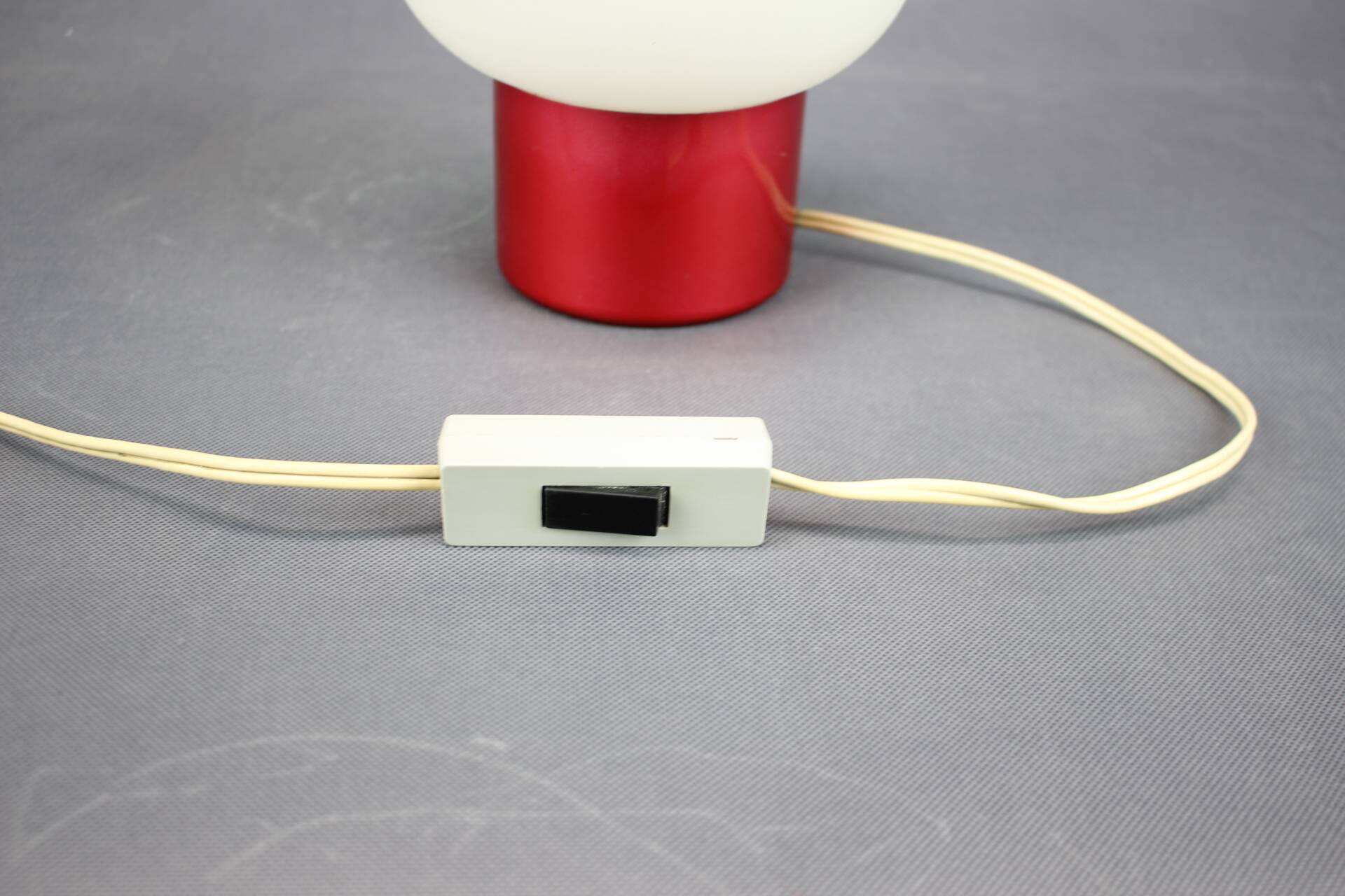 Burgundy Red opaline glass table lamp from the 1970s space age.