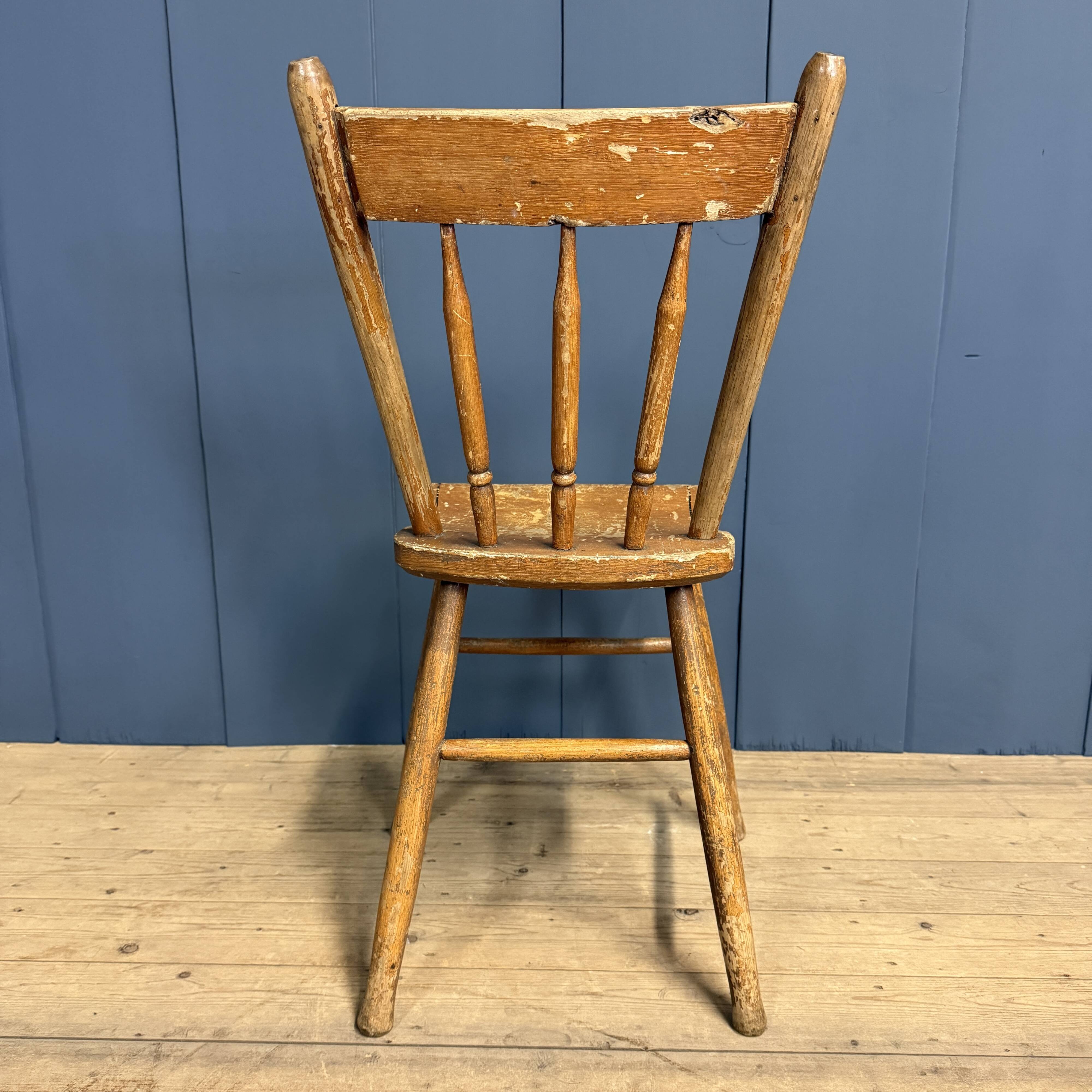 Set of four painted Dutch kitchen chairs.