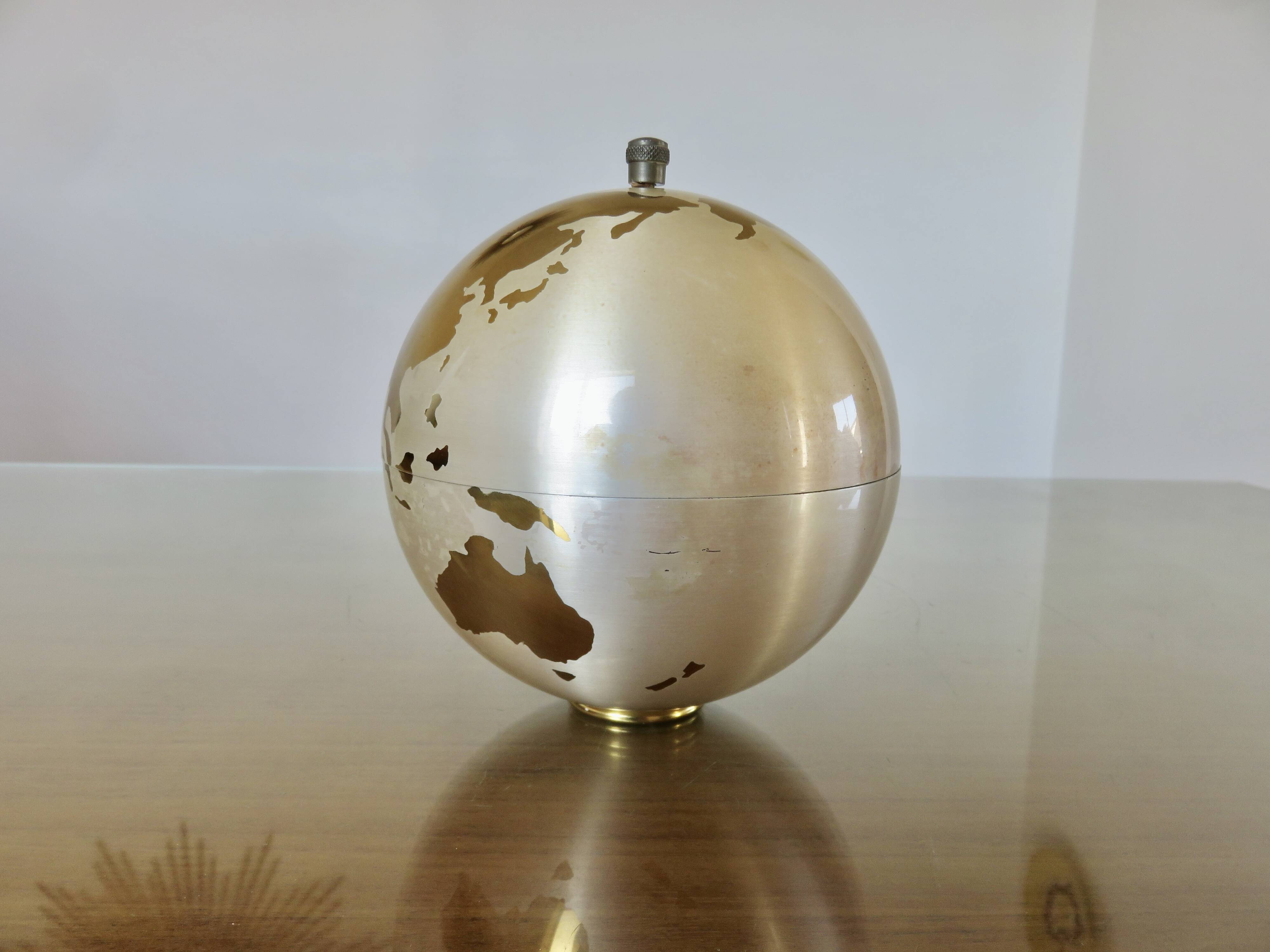 Large terrestrial globe, cigarette dispenser, brass, 1960 - 1970