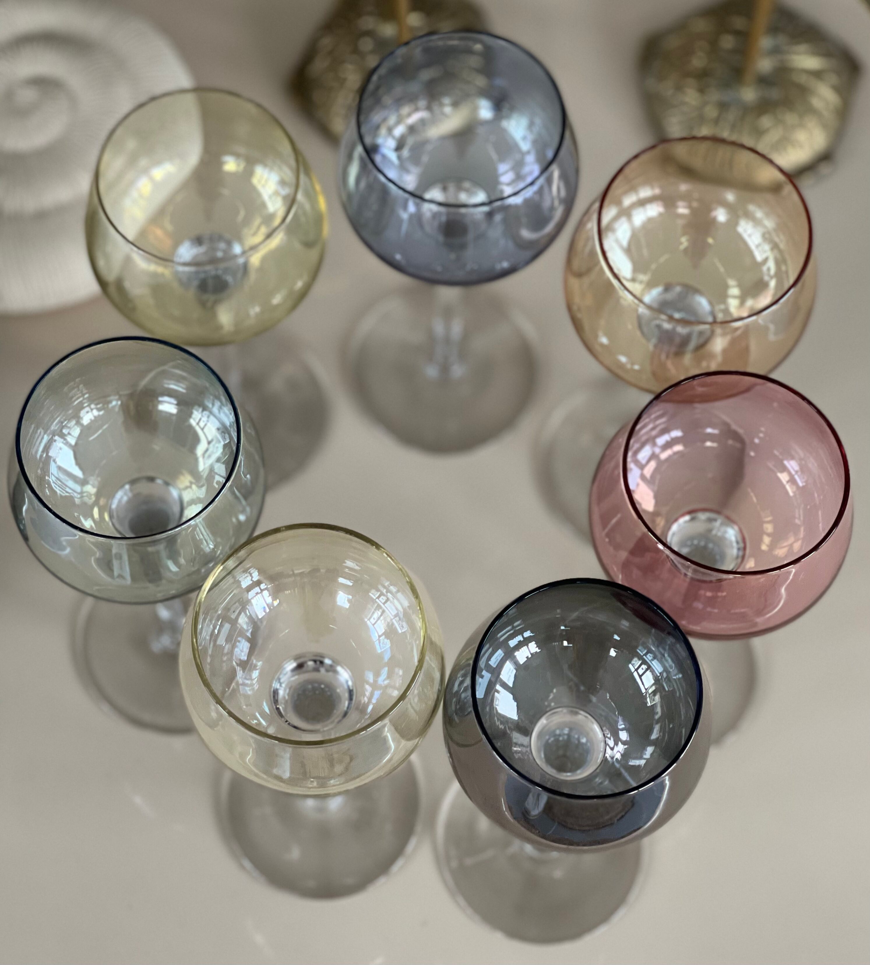 7 vintage iridescent foot glasses