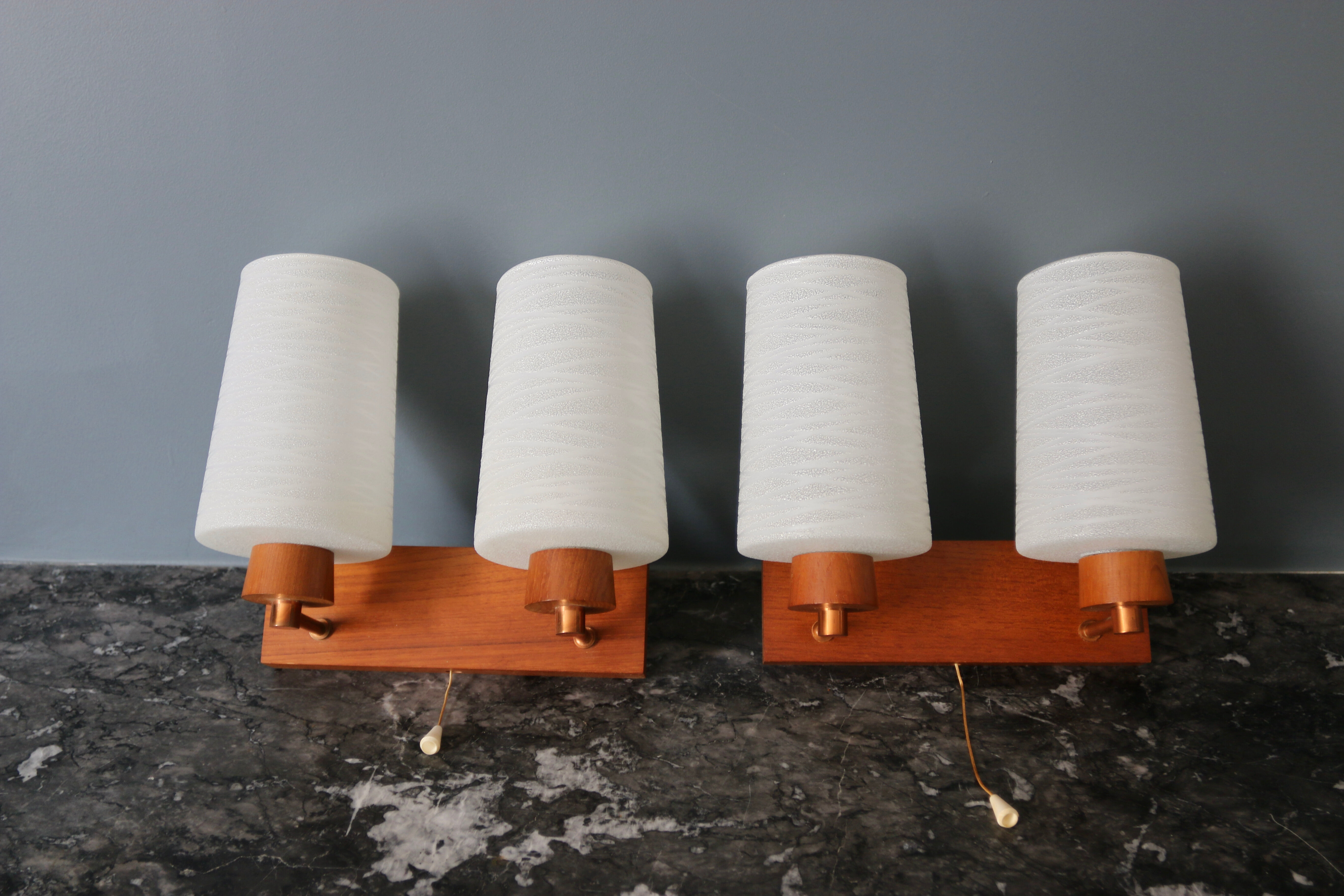 Pair of vintage Scandinavian wall lamps in teak and opaline 1960
