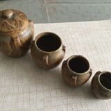 Set of four numbered Denbac spice jars