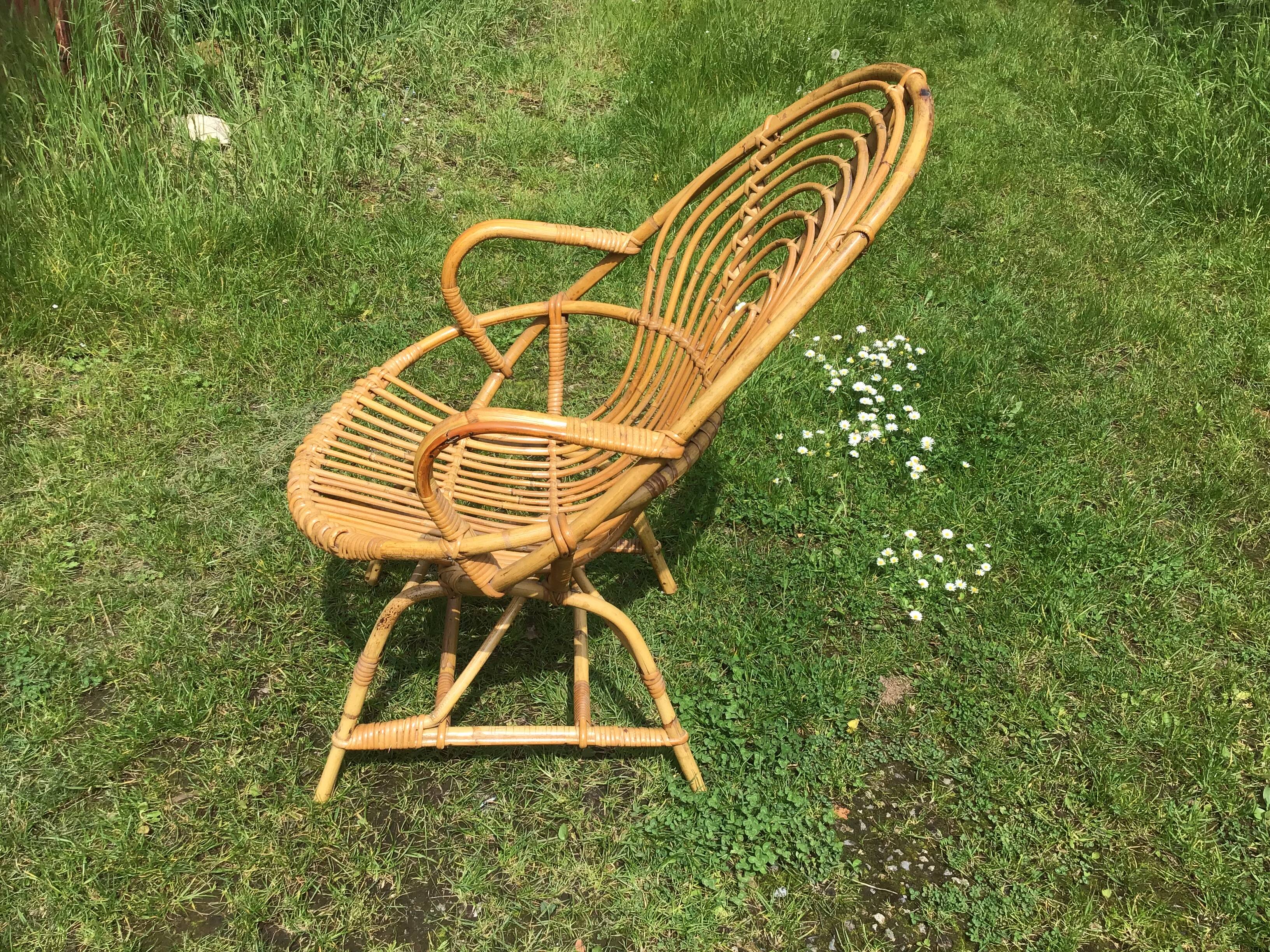 Vintage ovoid-shaped rattan armchair.
