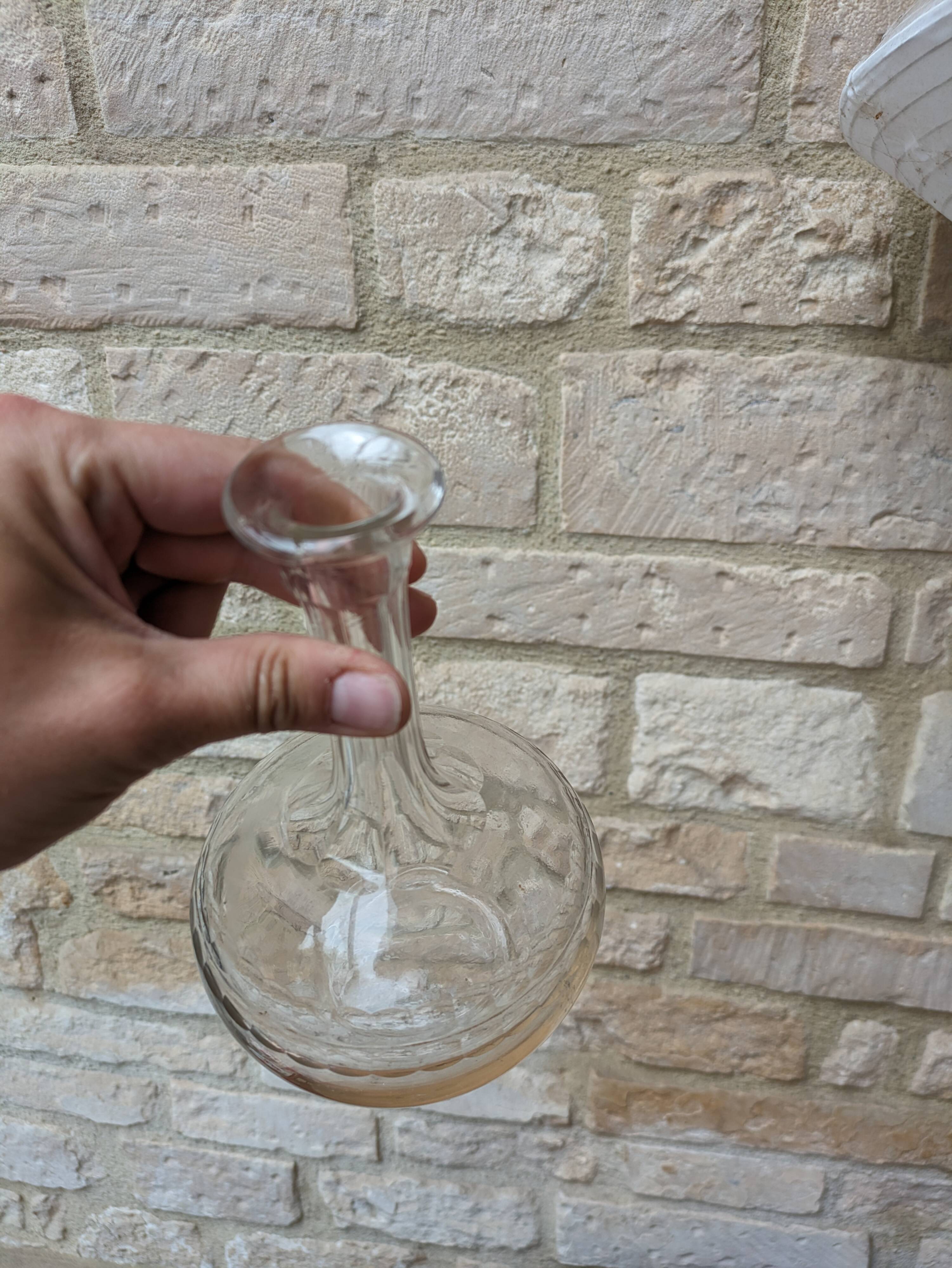 Antique round chiseled glass carafe with stopper