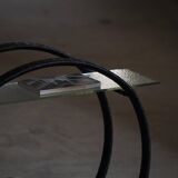 Decorative shelf unit, round metal frames with curved legs and glass shelves, 1960.