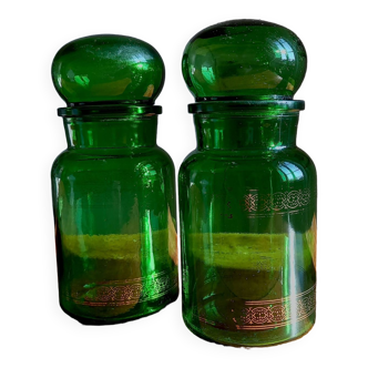 Pair of Belgian glass jars with corks. Old green and gold apothecary jars.