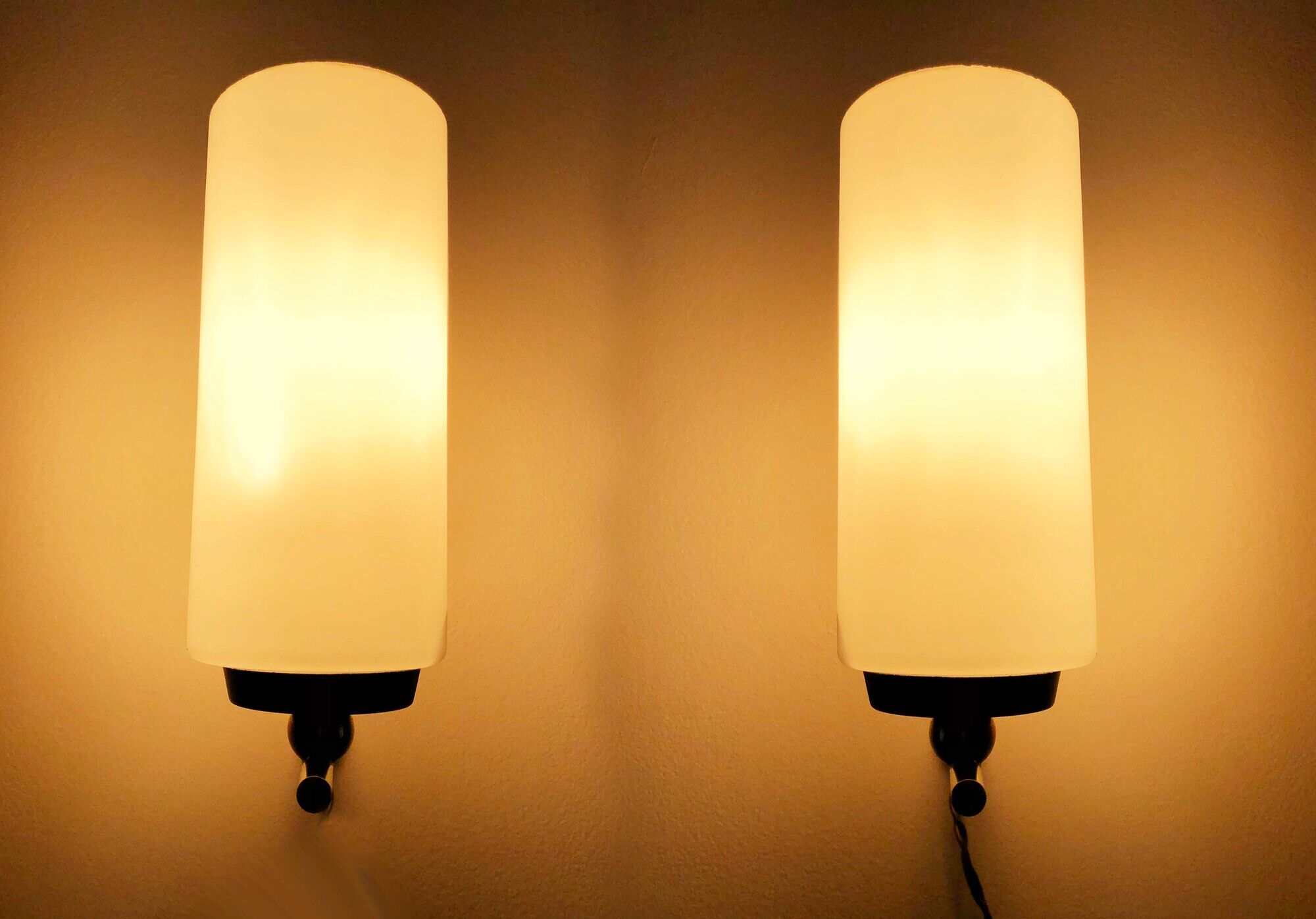 Pair of brass tube wall light and 1960s opalin glass