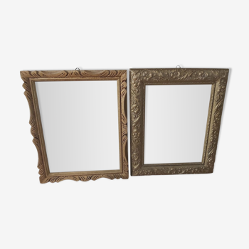 Two gilded wooden frames, with their windows