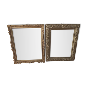 Two gilded wooden frames, with their windows