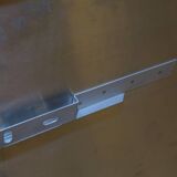 large smoked mirror on brushed aluminium