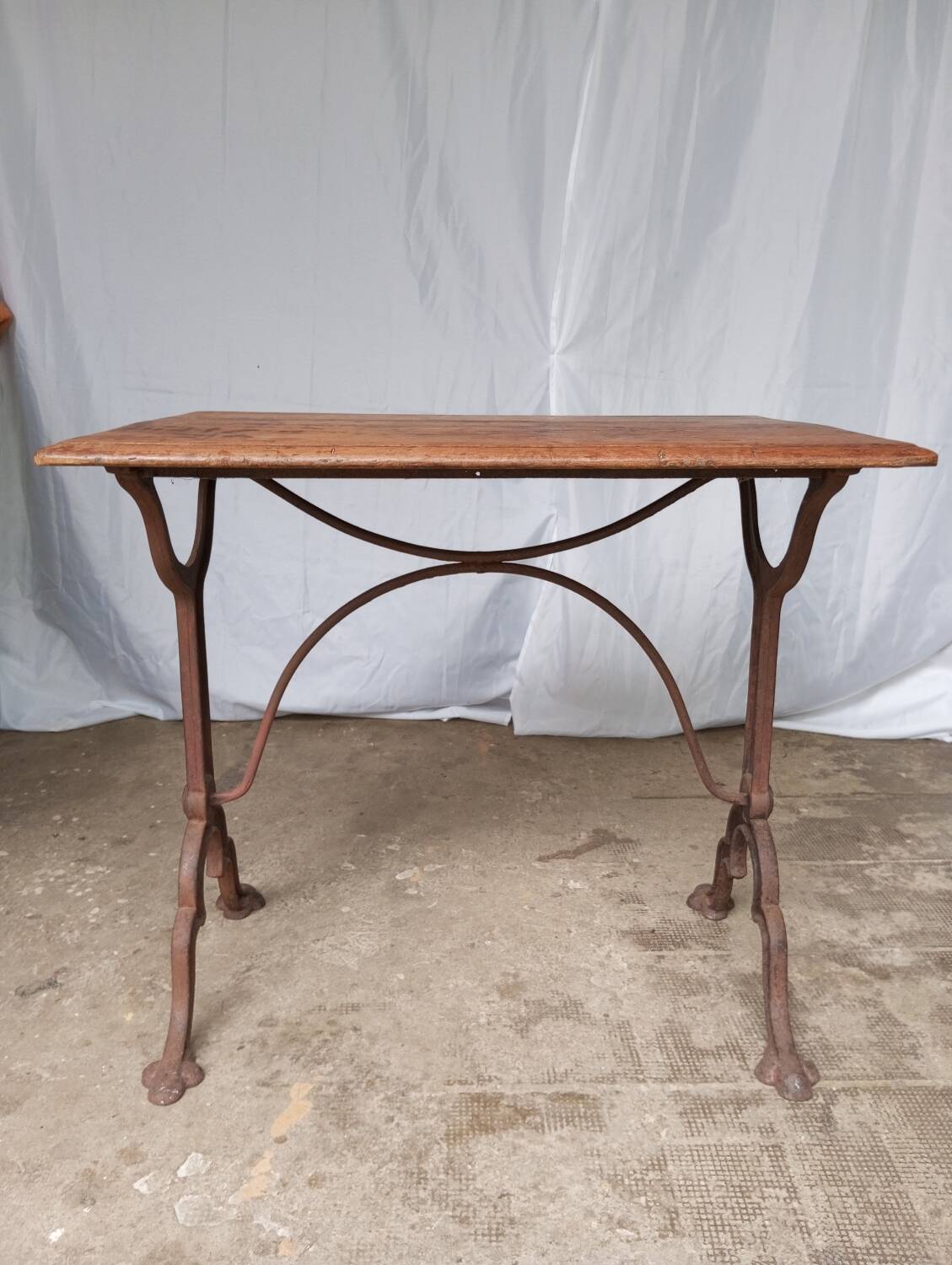 Antique bistro table with lion paws