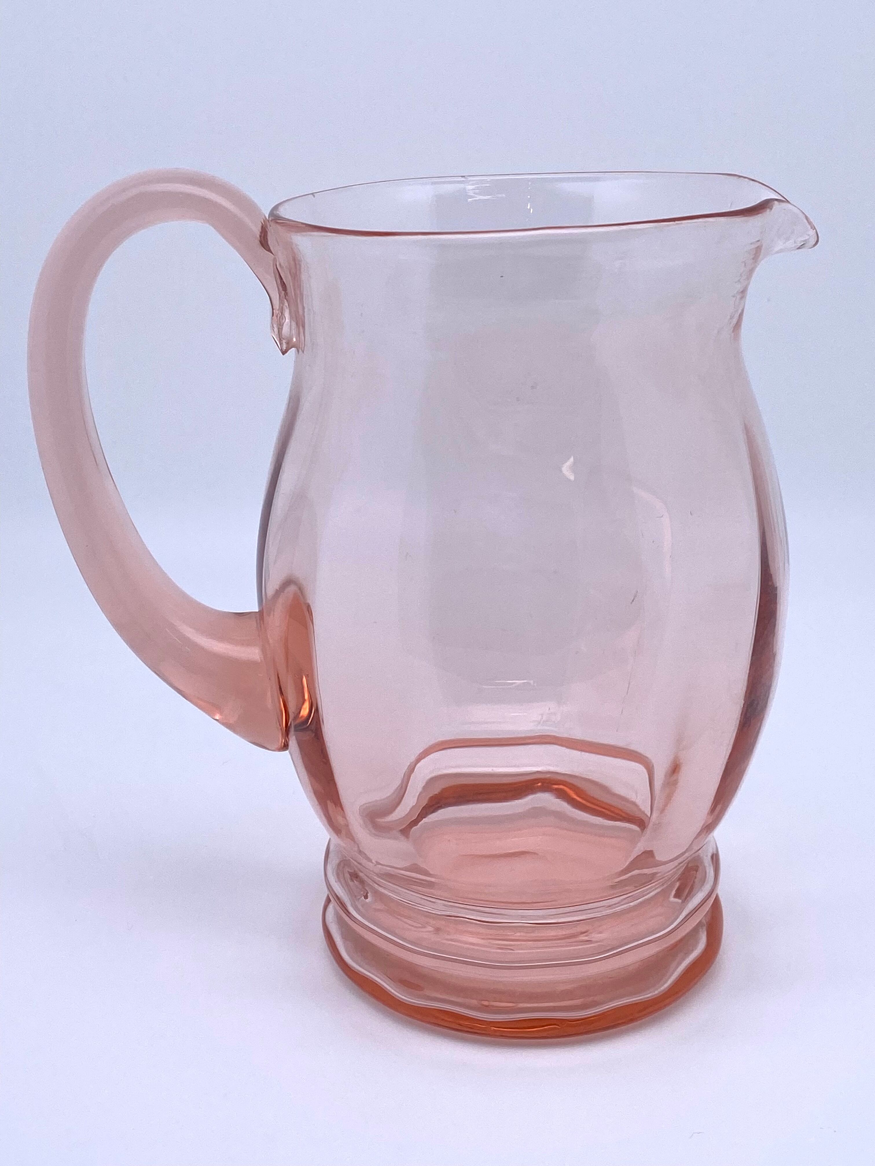 Rounded pink glass decanter