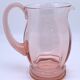 Rounded pink glass decanter