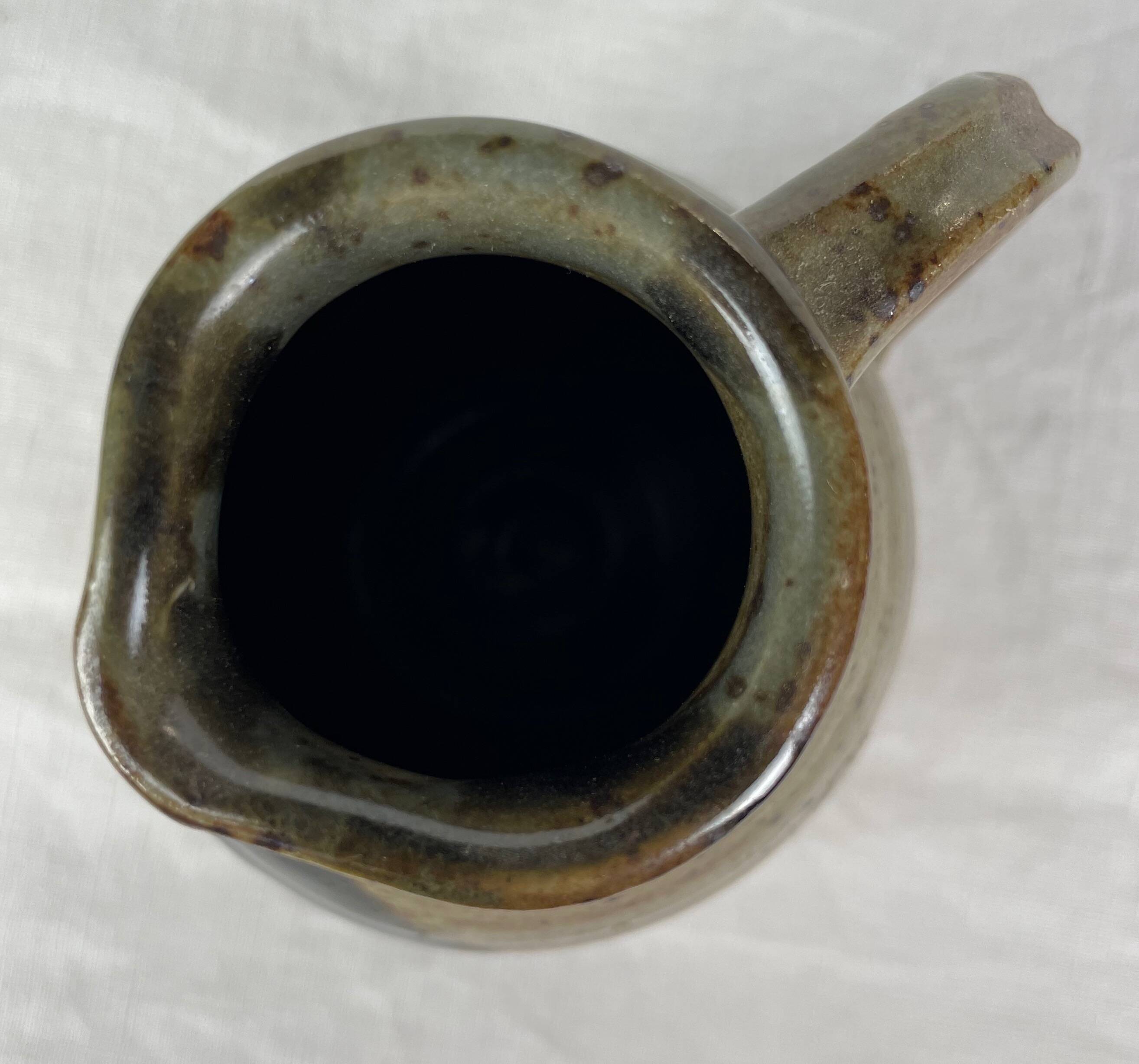 Milk jug in Matour pottery style