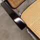 Fauteuil b64 Breuer noir cannage accoudoirs et tampons neufs