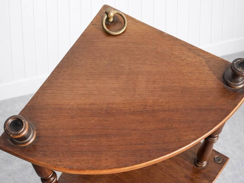 pair of corner wall brackets, Louis-Philippe style, in mahogany.