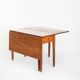 Vintage table with two folding leaves. Solid oak wood. France, 1940s