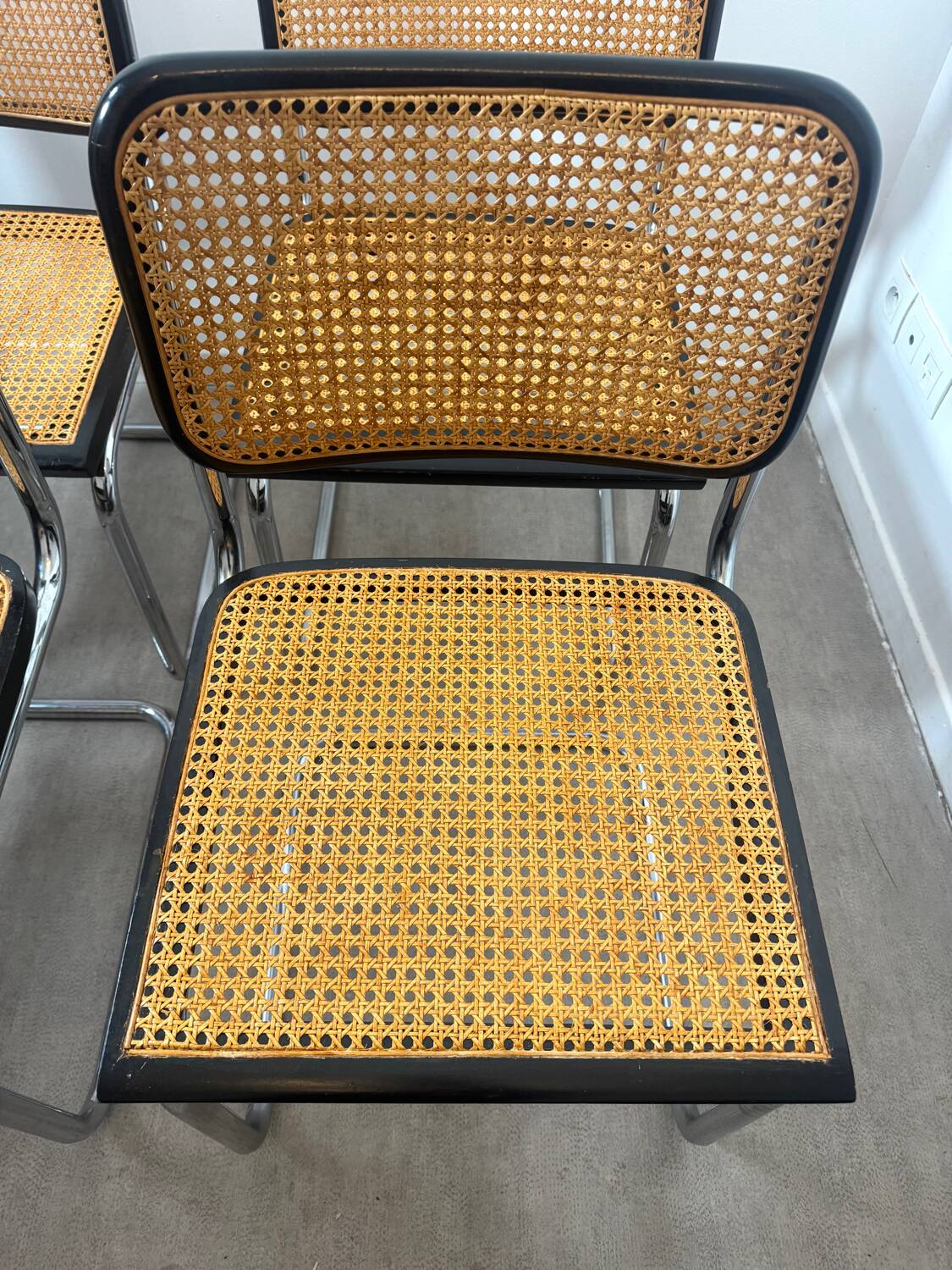 Set of four Marcel Breuer Cesca chairs made in Italy.