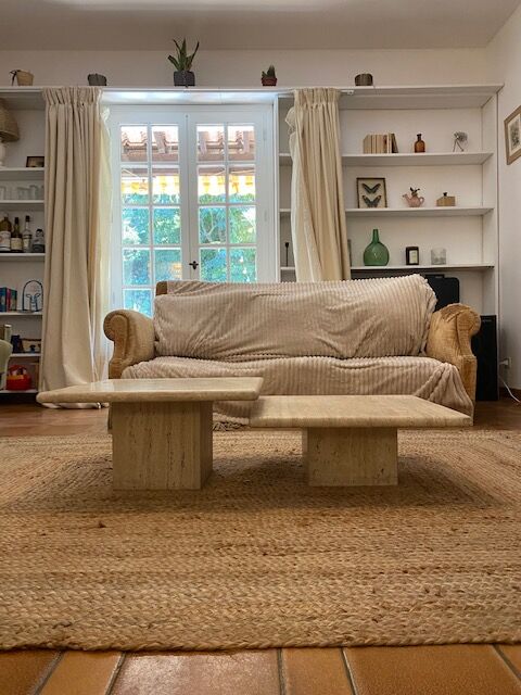 2 log-out travertine coffee tables