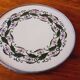 Porcelain and zinc trivet circa 1900