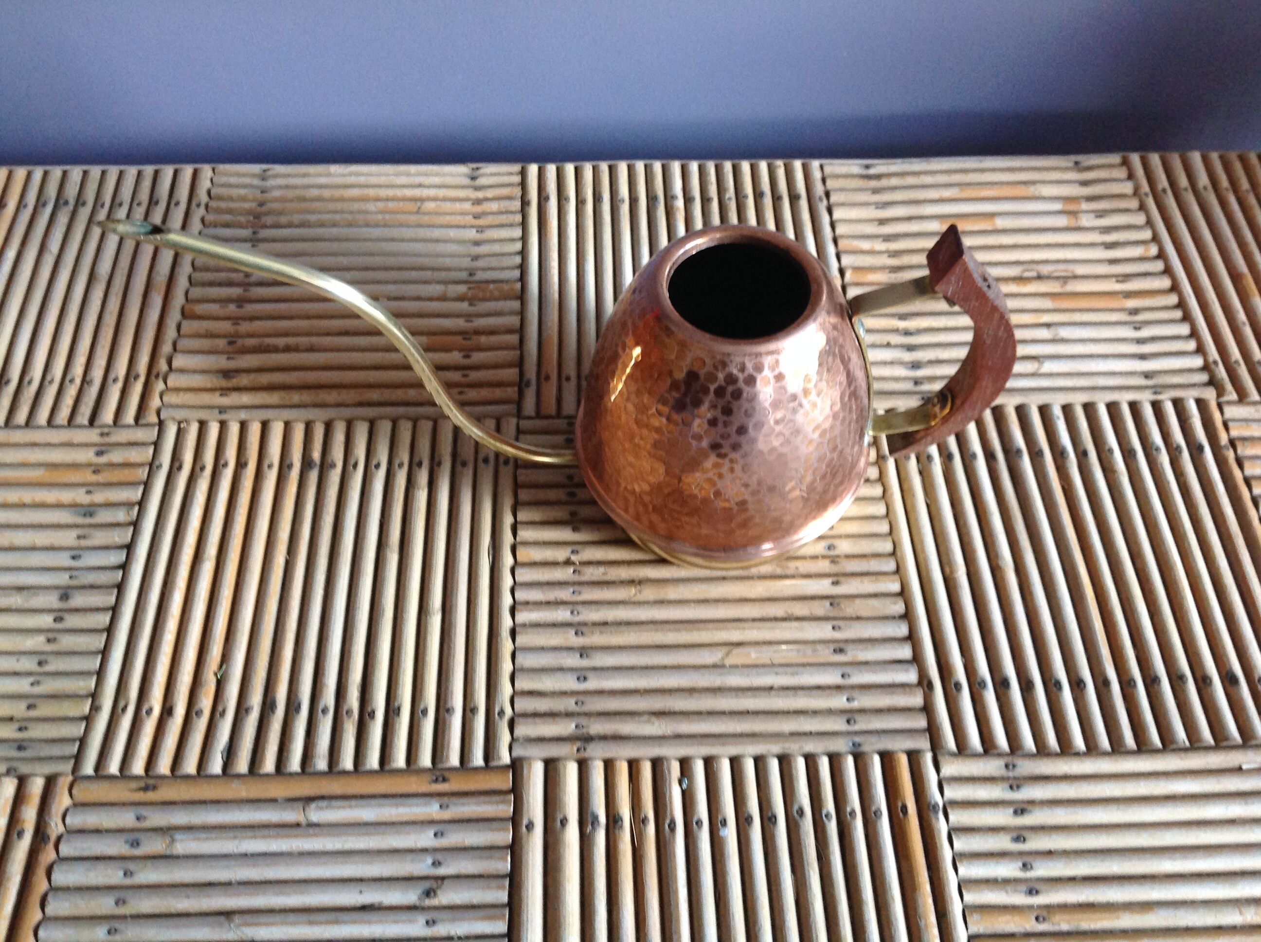 Copper and brass watering can