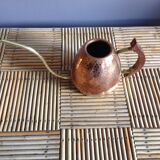 Copper and brass watering can
