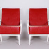 Red Leather mid Century Armchairs made in 1950s Czechia. Restored beech.