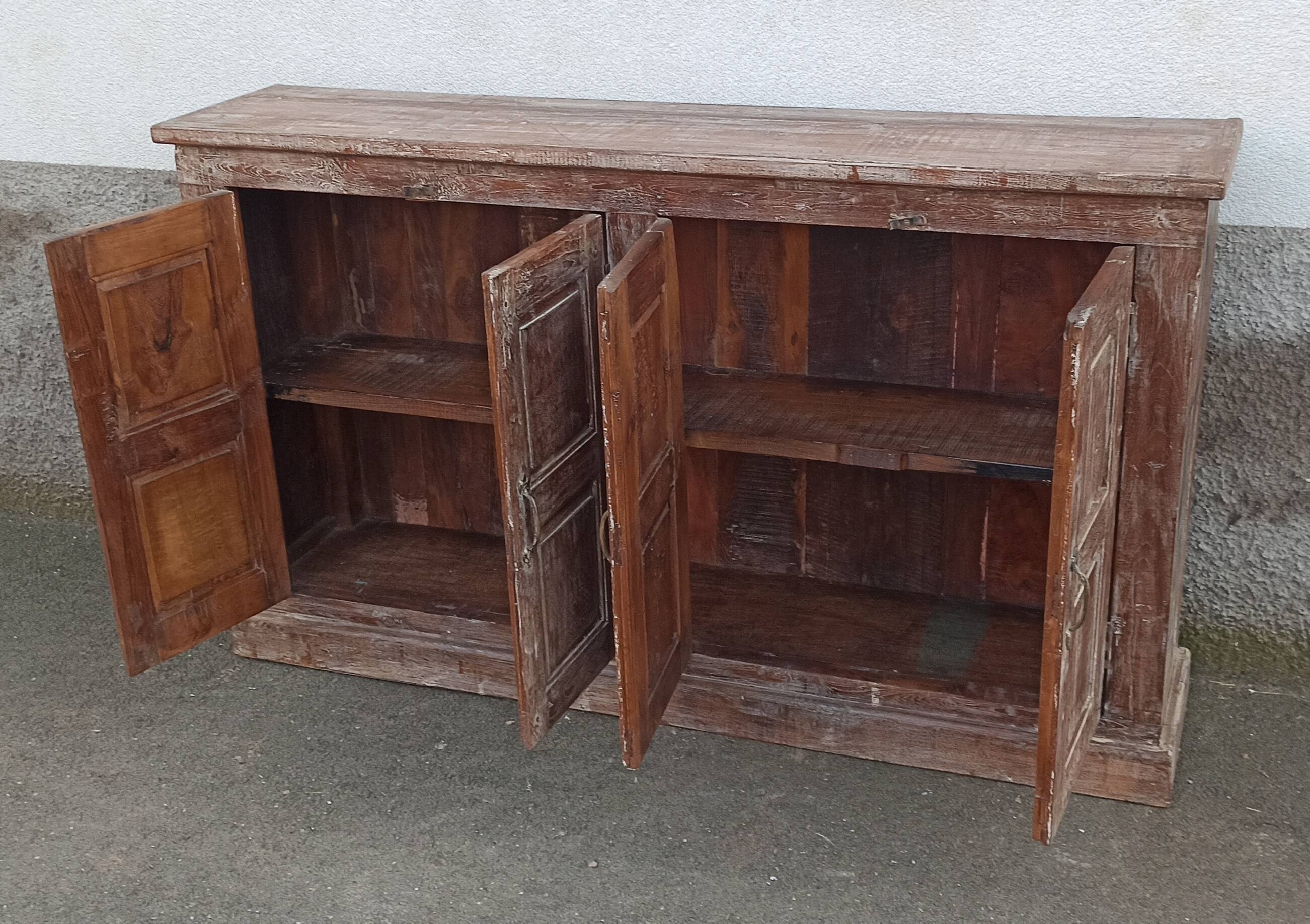 Old wooden sideboard with 4 doors