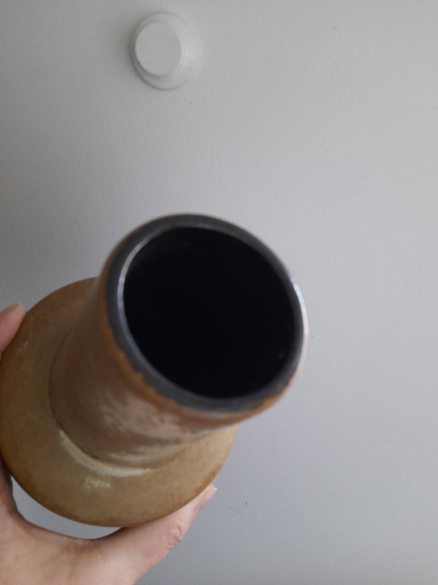 Beautiful ceramic saucer vase