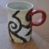 Glazed stoneware mug with snail motif signed