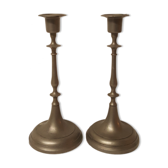 Pair of tin candlesticks