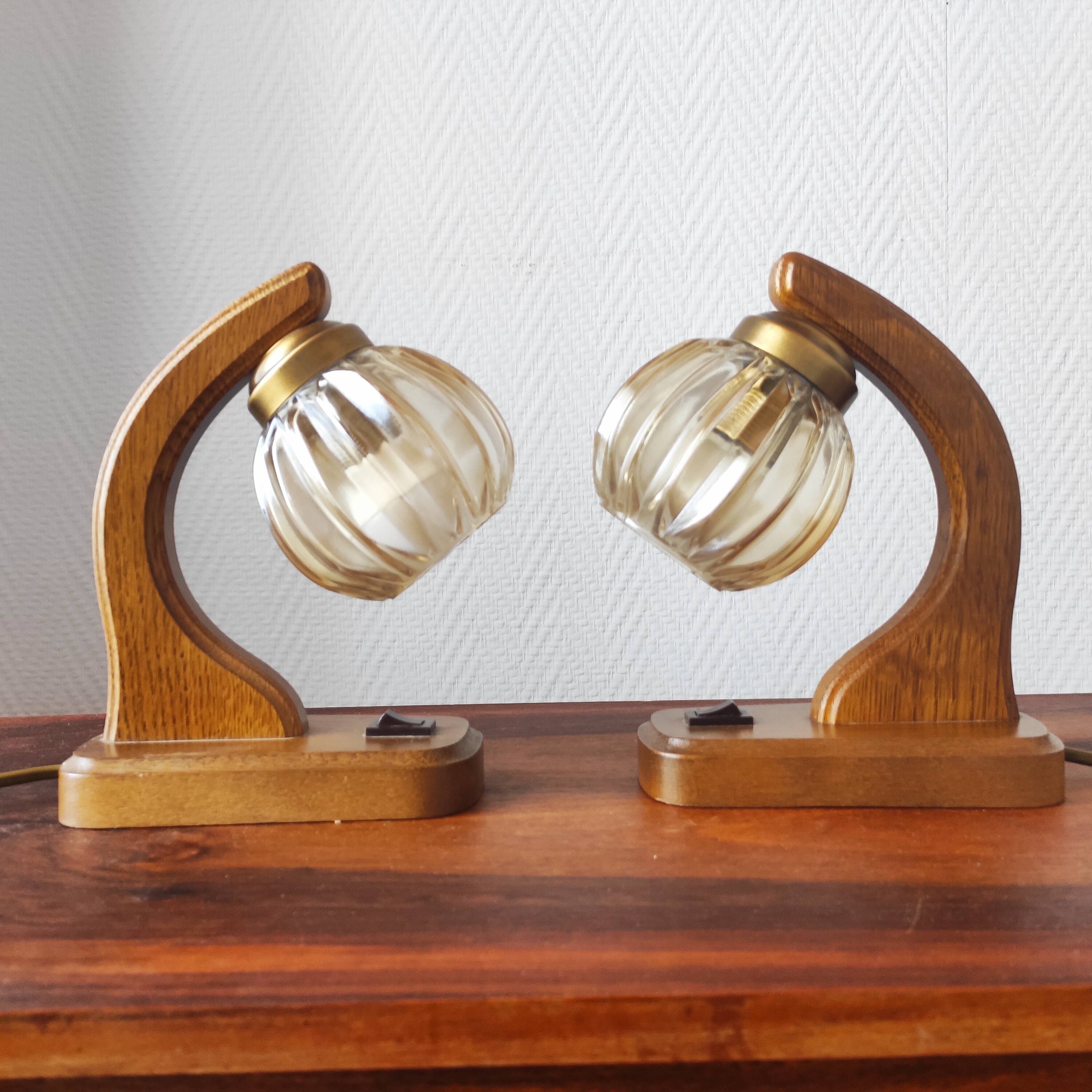 Pair of vintage 1970s mid-century Scandinavian lamps with amber globe.