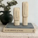 Set of two minimalist stone face statues