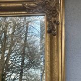 vintage beveled mirror in rectangular shape stucco and gilded wood in Louis XV baroque style